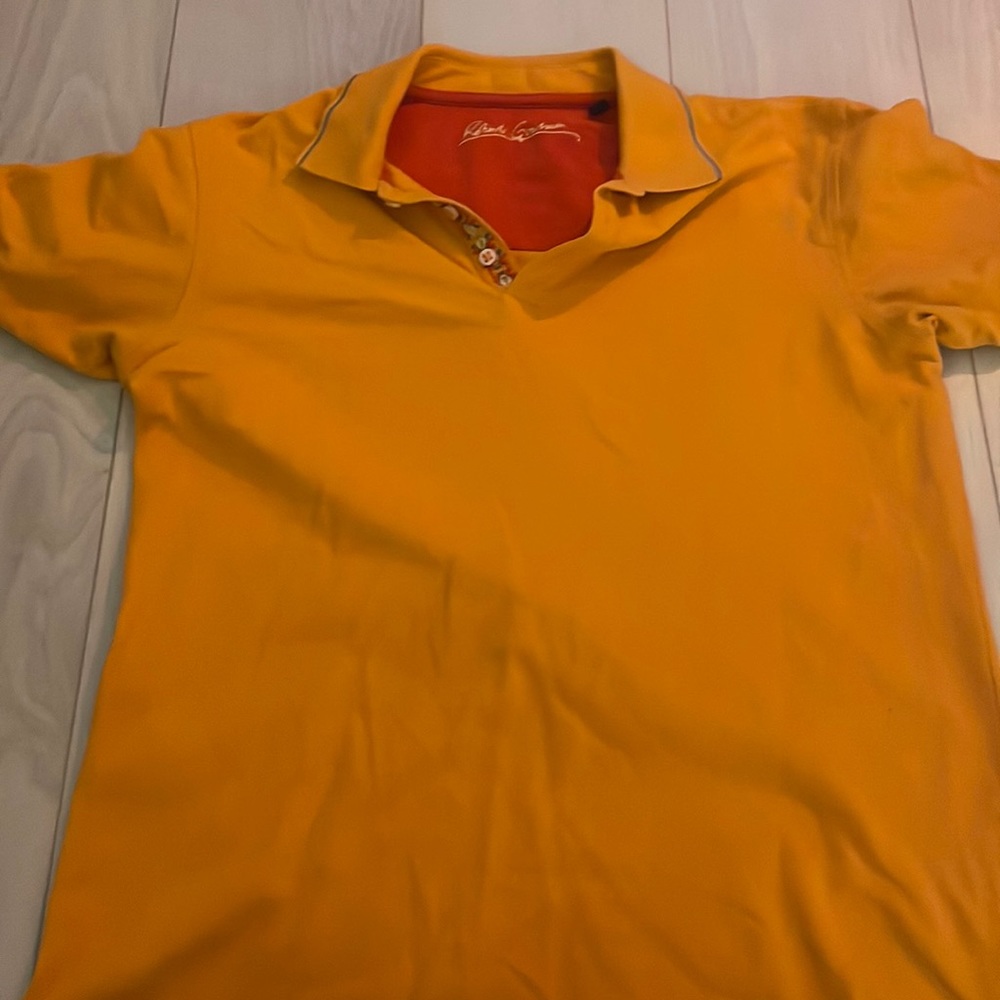Robert Graham orange polo.